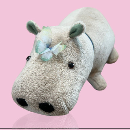 Plush hippo memory bear - hippo  with a butterfly on a pink background, labeled 'Harri the Hippo' by Jenny.